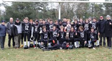 Littleside football goes undefeated to win championship