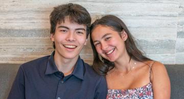 two students smiling
